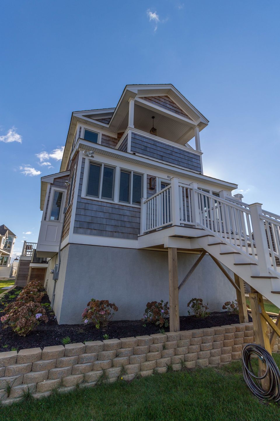Tall beach house with exterior stairs