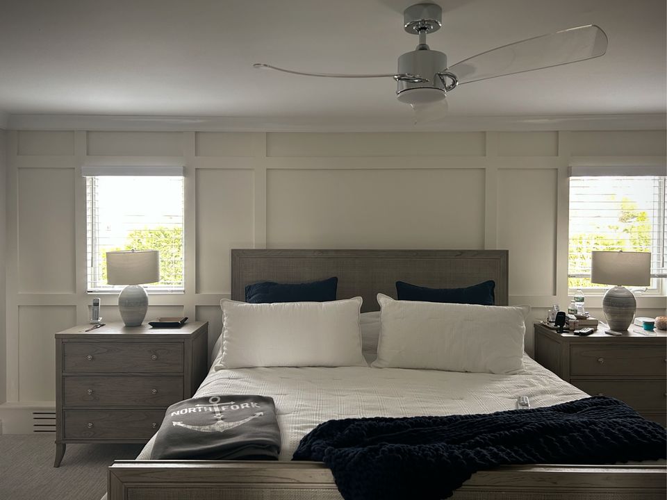 Bedroom with a board and batten accent wall