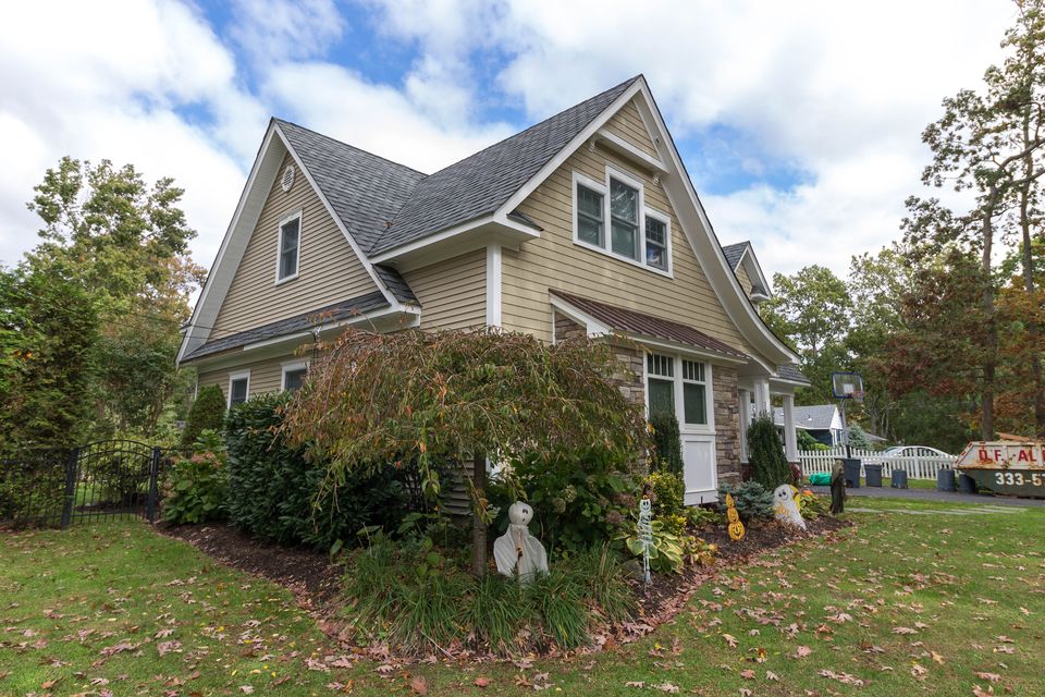 Craftsman style home seen from the side in the fall