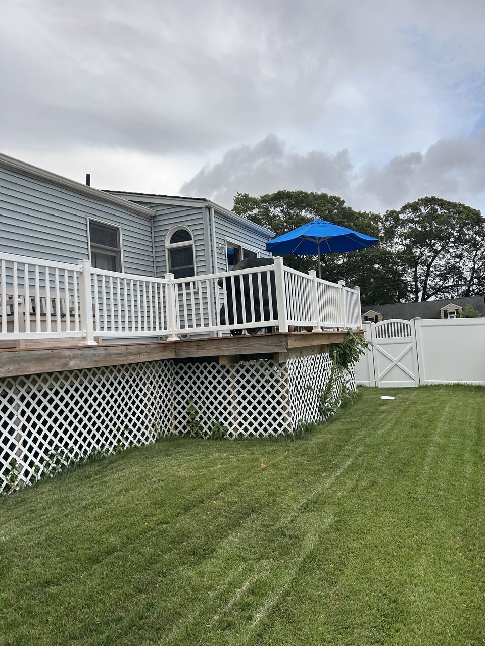 Raised deck and lattice skirting from the lawn