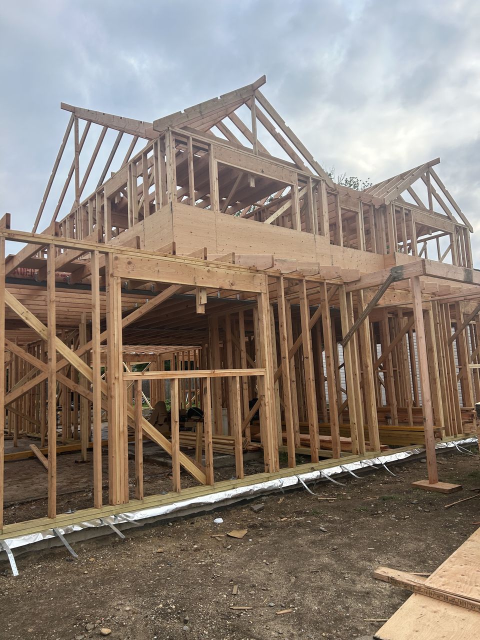 New build framing with gables over the second floor deck