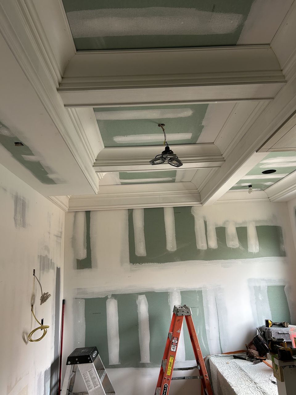 Coffered ceiling framed and trimmed over the bath