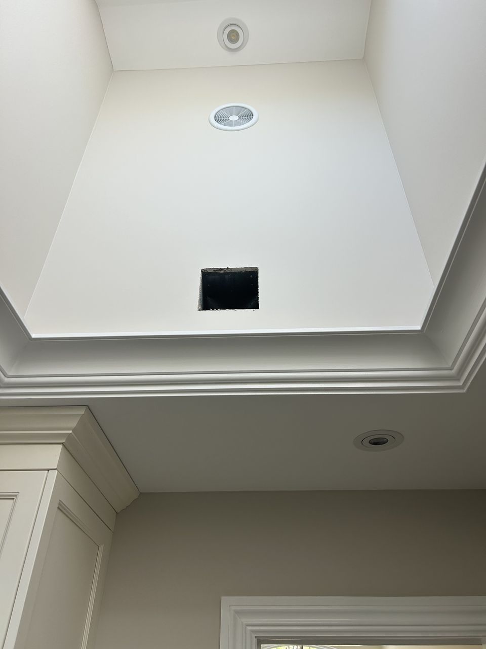 Tray ceiling with crown molding over the bath