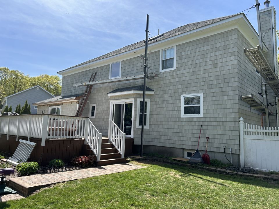 Rear of the house in cedar shake above the deck