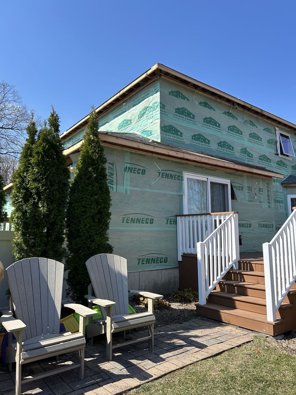 Side stairs and a wall wrapped and ready for siding
