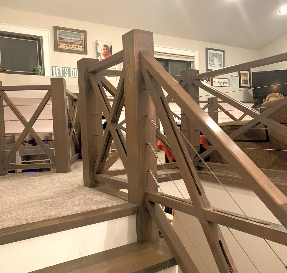 Custom X pattern wood stair rail